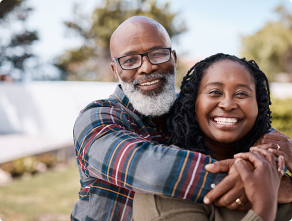 A man hugging a woman